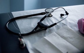 A stethoscope sits on an examination table in an exam room at a Community Clinic health center in Takoma Park, Md. MUST CREDIT: Bloomberg photo by And