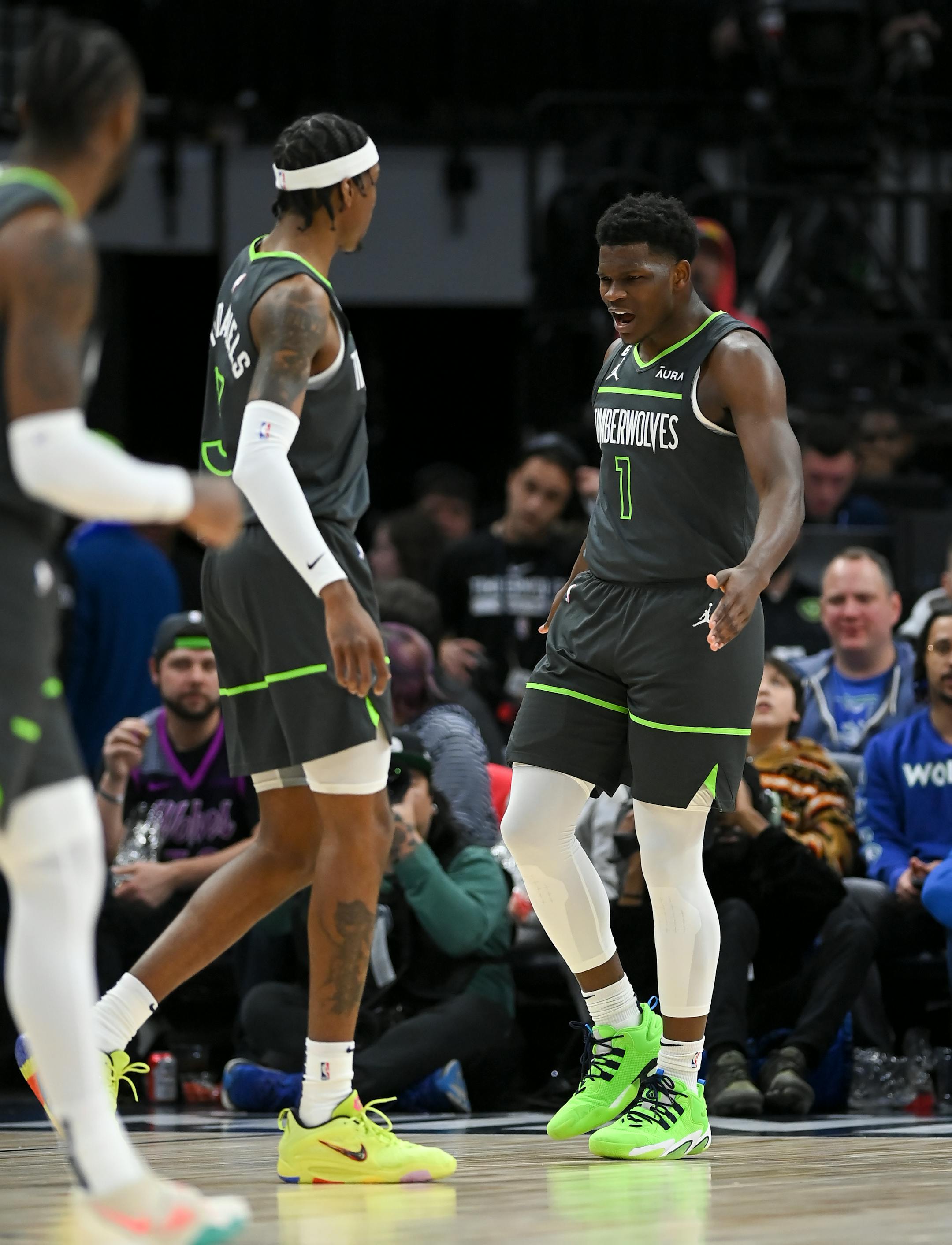 Minnesota Timberwolves guard Anthony Edwards (1) reacts after scoring a layup with an and-one opportunity against the Detroit Pistons during the first half.