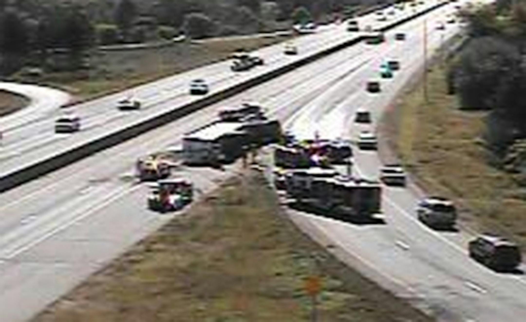 An overturned semitrailer truck blocked traffic on southbound I-35W at Hwy. 10 near Shoreview Monday morning. Photo courtesy MnDOT..