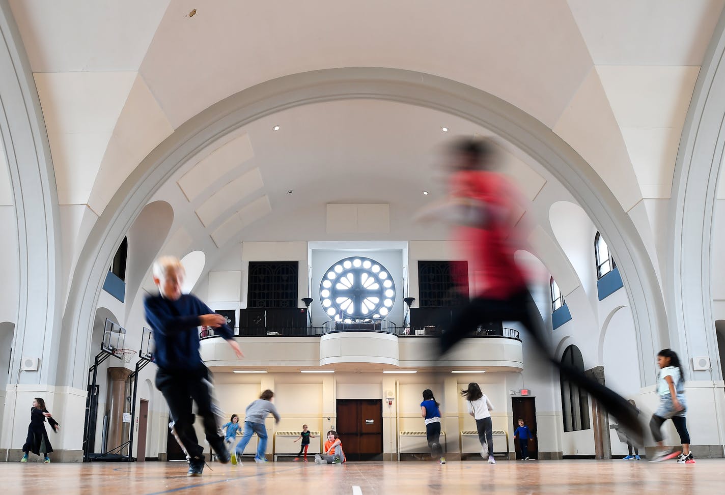 Twin Cities German Immersion School students played in the former Catholic church turned gymnasium Tuesday. ] AARON LAVINSKY &#x2022; aaron.lavinsky@startribune.com Neighborhood angst is brewing in Como Park, as the Twin Cities German Immersion School considers tearing down a former Catholic church it owns and has used as a gym and cafeteria to make room for expansion. Neighbors are not happy and want the school to find a way to preserve the former St. Andrew's Catholic Church, built in 1927. We