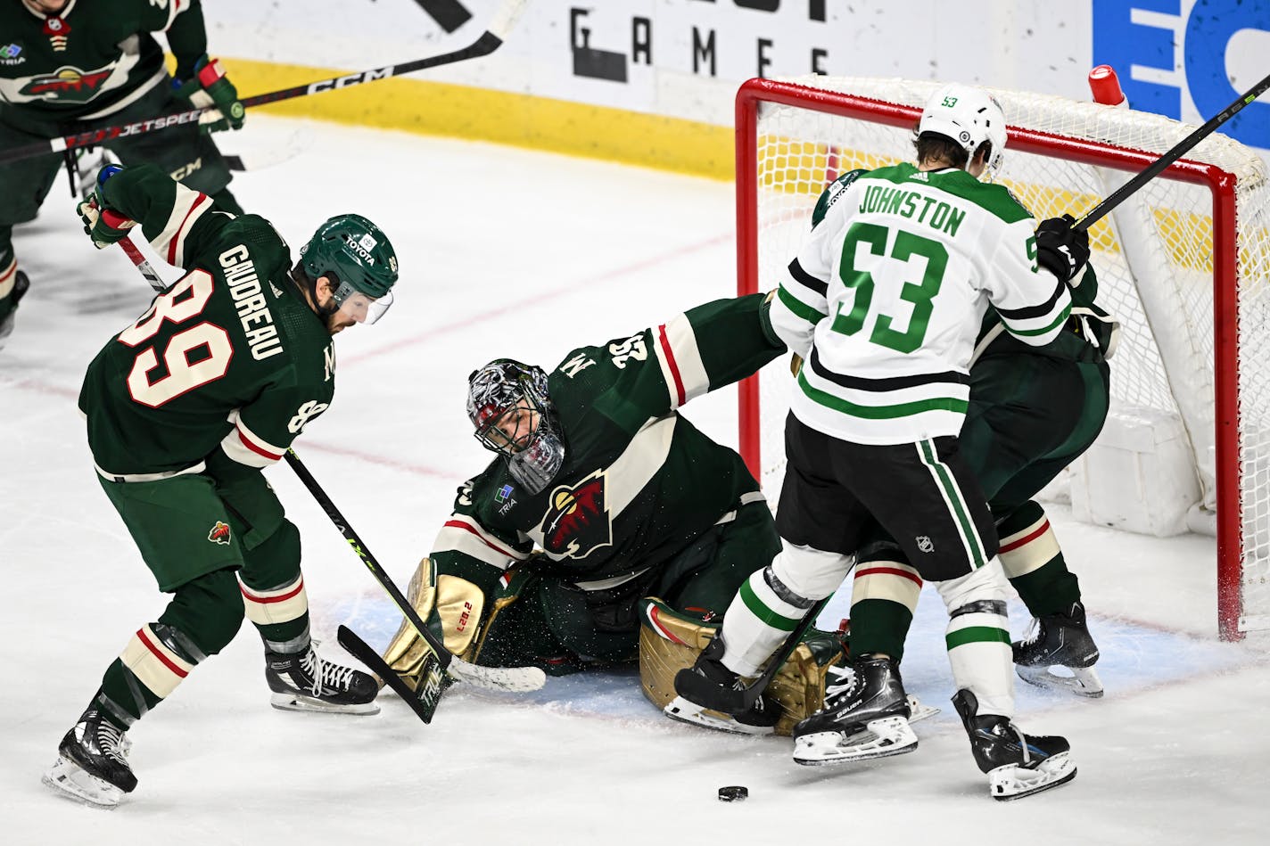 With the help up Minnesota Wild center Frederick Gaudreau (89), goaltender Marc-Andre Fleury (29) stops a scoring attempt by the Dallas Stars as center Wyatt Johnston (53) attacks the goal during the second period of an NHL hockey game Thursday, Dec. 29, 2022 at the Xcel Energy Center in St. Paul, Minn... ] AARON LAVINSKY • aaron.lavinsky@startribune.com