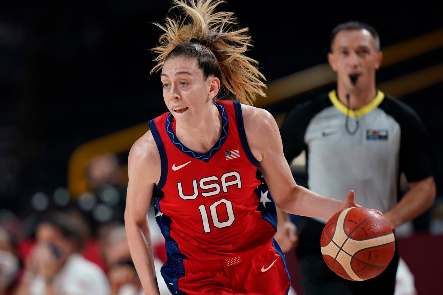 Breanna Stewart drives to the basket against Australia during a women's basketball quarterfinal game at the 2020 Summer Olympics