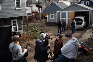 Filming takes place in a St. Paul backyard on Feb. 6 for "Unholy Communion," Scandia author Thomas Rumreich's murder mystery.