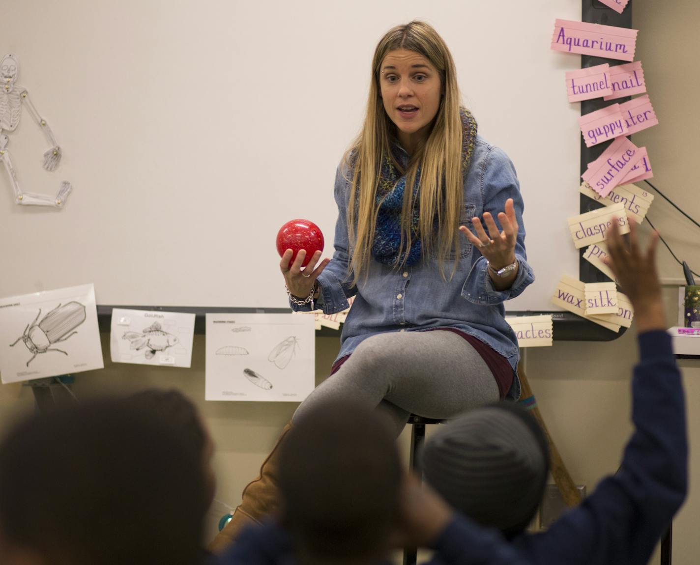 In an effort to get her students to sit down quietly, Shanley uses a red ball to reward behavior. "First I glance at their spot to see if their area is clean and chair is pushed in. If those things are done, I acknowledge their good choices by throwing them the ball. Students can be so chatty and slow to come to the carpet for a group discussion or closing, so this encourages them to move a little more quickly." ] In Minneapolis Public Schools, Bethune is one of the district's most challenged sc