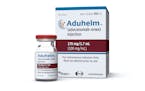 This image provided by Biogen on Monday, June 7, 2021 shows a vial and packaging for the drug Aduhelm.