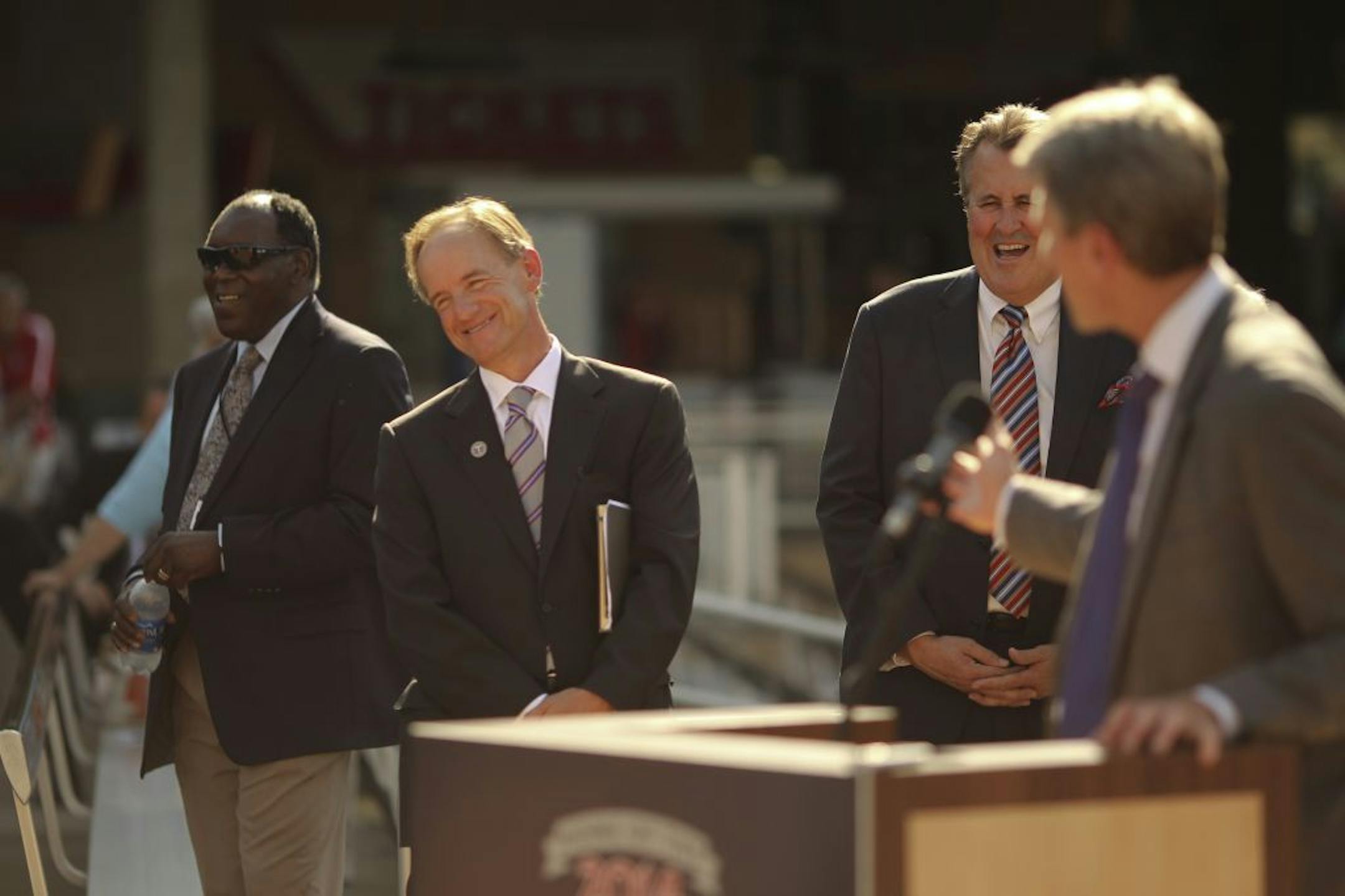 Mayor R.T. Rybak, right, joked with Twins owner Jim Pohlad, second from left, and other officials while announcing the 2014 All-Star Game will be at Target Field.