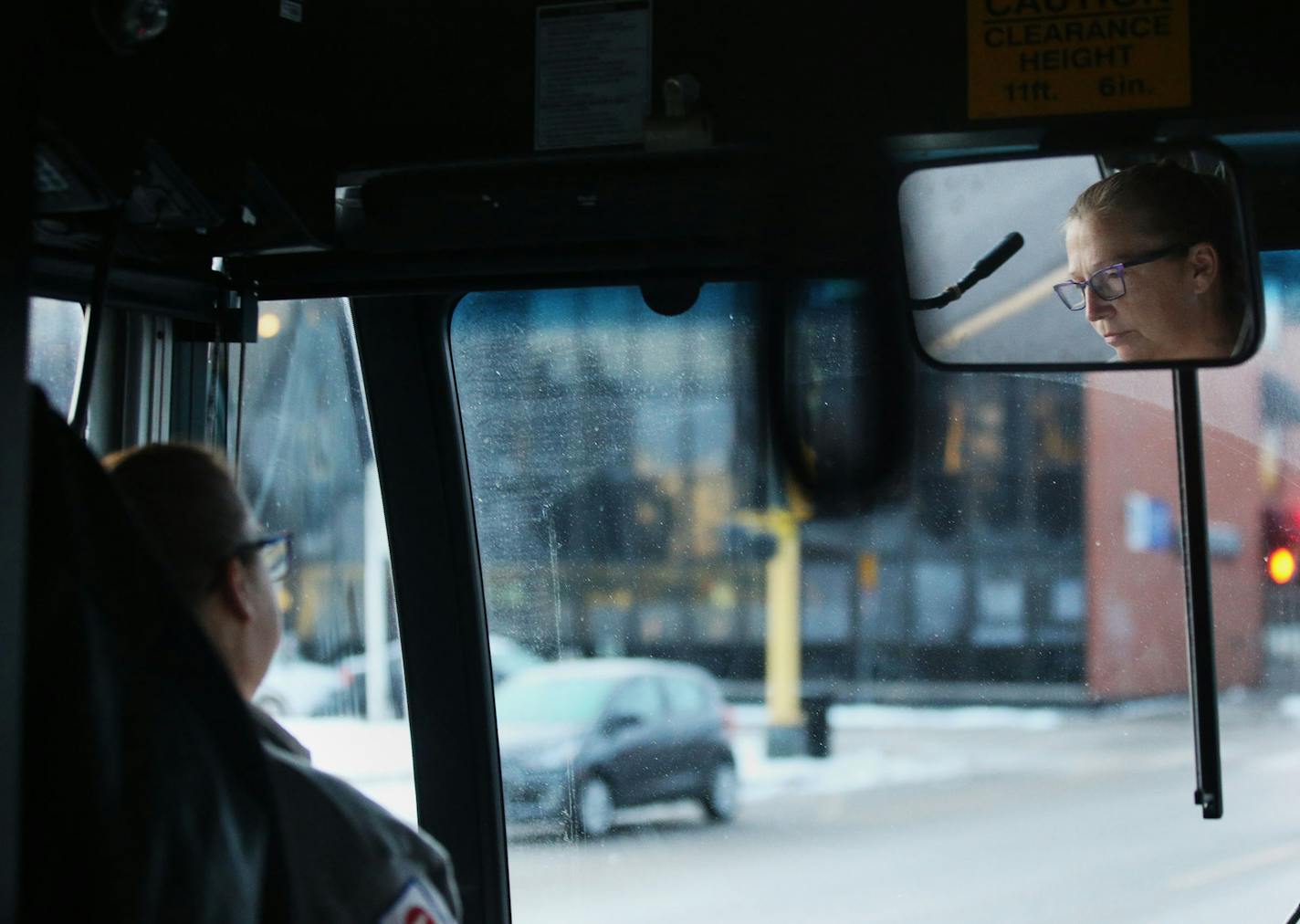 Metro Bus driver Deb Sievers heads along her route in downtown Minneapolis and Uptown Thursday, Dec. 14, 2017, in Minneapolis, MN. Sievers, who has driven a Metro bus for 13 plus years, has been spit on twice and punched in the face, requiring medical service, as well as being threatened with her life. She is also a peer counselor for fellow Metro Bus drivers who have been assaulted. "I have seen a lot," Sievers said.] DAVID JOLES &#xef; david.joles@startribune.com Continued assaults on local bu