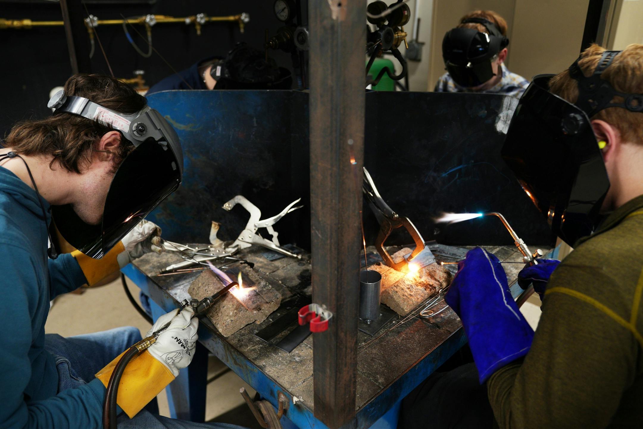 Students, including Will Curtis of Red Wing, left, practiced their welding technique.