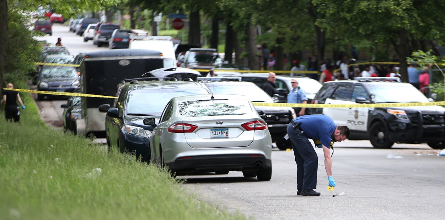 Minneapolis Police investigated the scene of a shooting Monday afternoon. ] Mark Vancleave - mark.vancleave@startribune.com * A shooing left one man dead and two hospitalized on the 2700 block of 3rd St. North on Monday, May 25, 2015 in Minneapolis. ORG XMIT: MIN1505251554460545