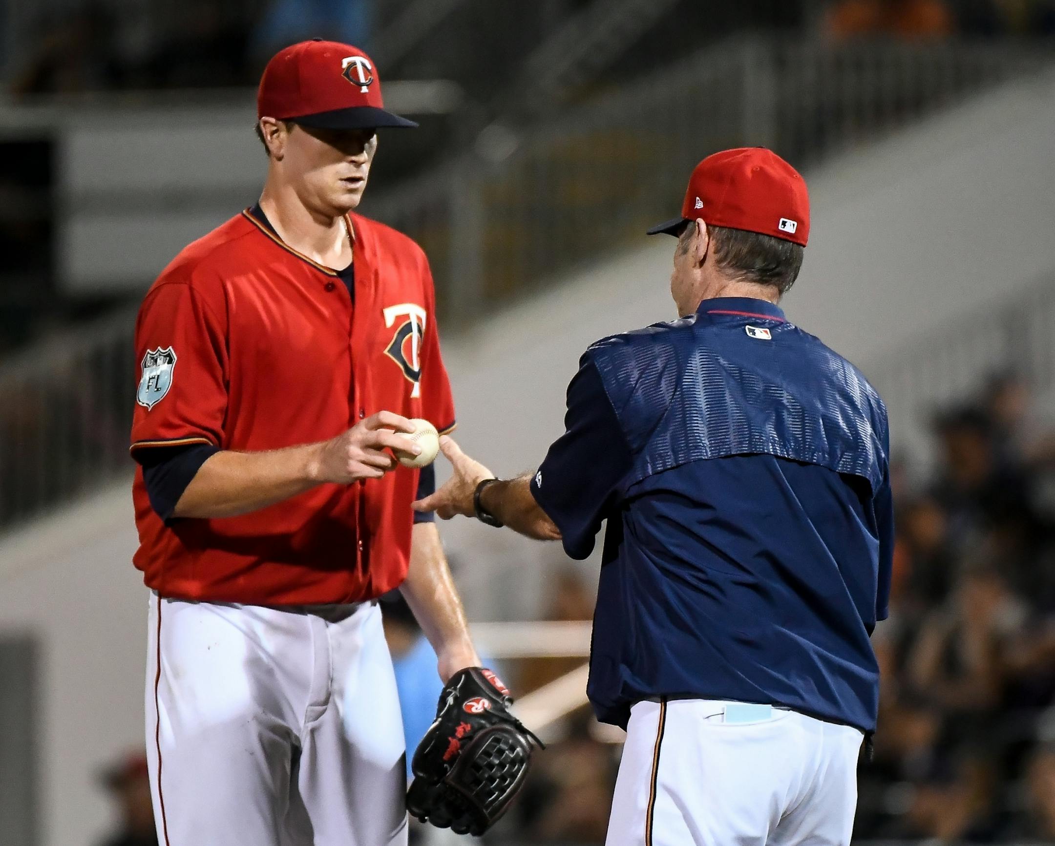 Minnesota Twins starting pitcher Kyle Gibson (44) handed the ball to manager Paul Molitor after being pulled from the game in the top of the second inning.