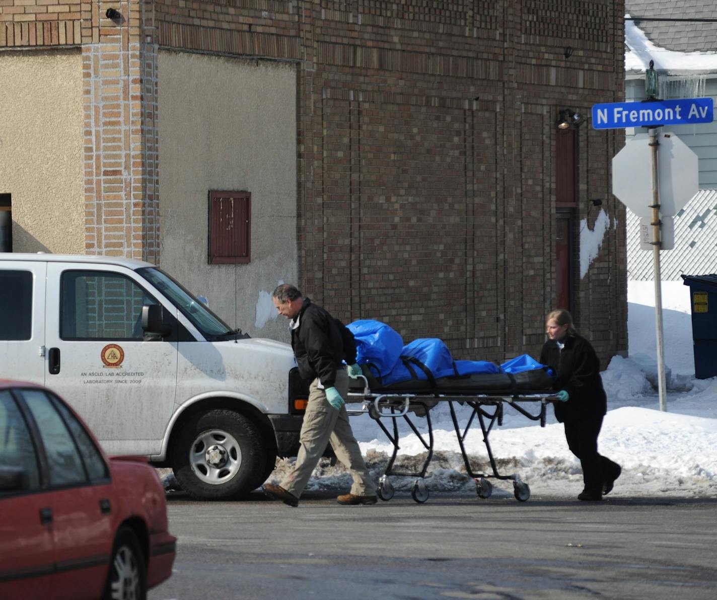 Shooting scene where two people were fatally shot and another was wounded early Friday at an after-hours establishment at 39th St. and Fremont Av. N. in Minneapolis, according to Minneapolis police. Officials removed a body from the shooting scene.