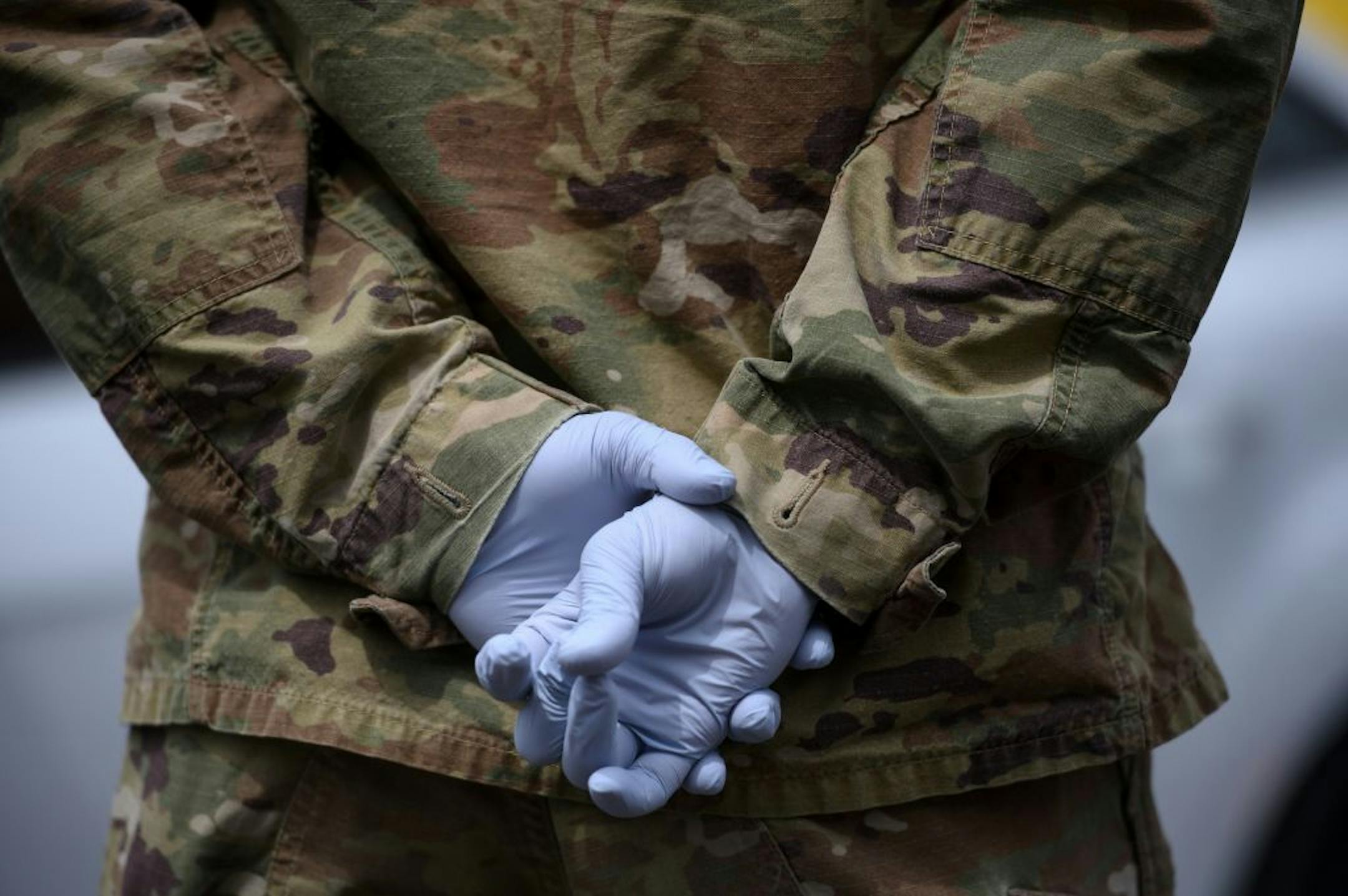 A Minnesota National Guardsman wore medical gloves to Saturday's free testing event at the Minneapolis Armory.