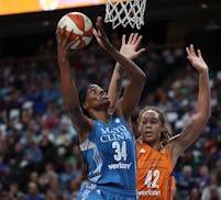 Lynx center Sylvia Fowles shot over Phoenix center Brittney Griner during Game 2 of the their WNBA playoff series last season.