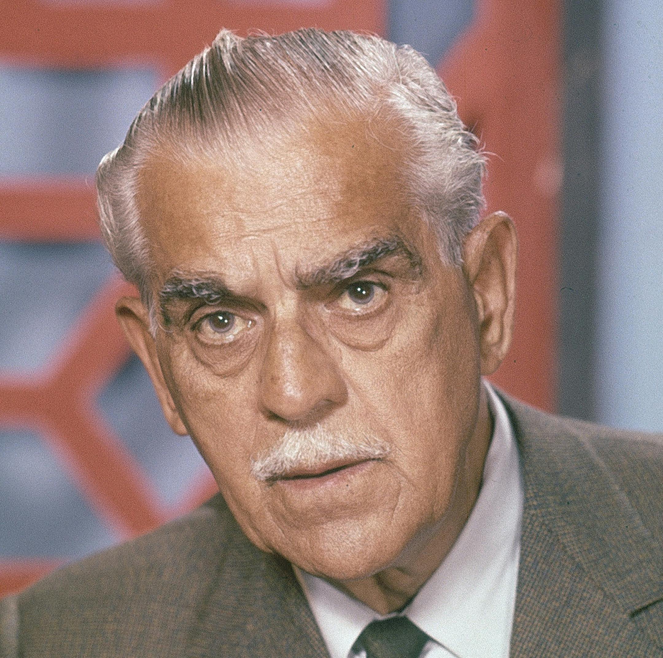 Actor Boris Karloff holds a watch, date and location unknown. (AP Photo) ORG XMIT: APHS102840