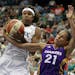 The Lynx's Rebekkah Brunson, left, battled with the Sparks' Ticha Penicheiro for a rebound on Tuesday.