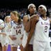 LSU forward Angel Reese and forward Amani Bartlett (2) celebrate after their won an early-round game in the NCAA tournament last month.