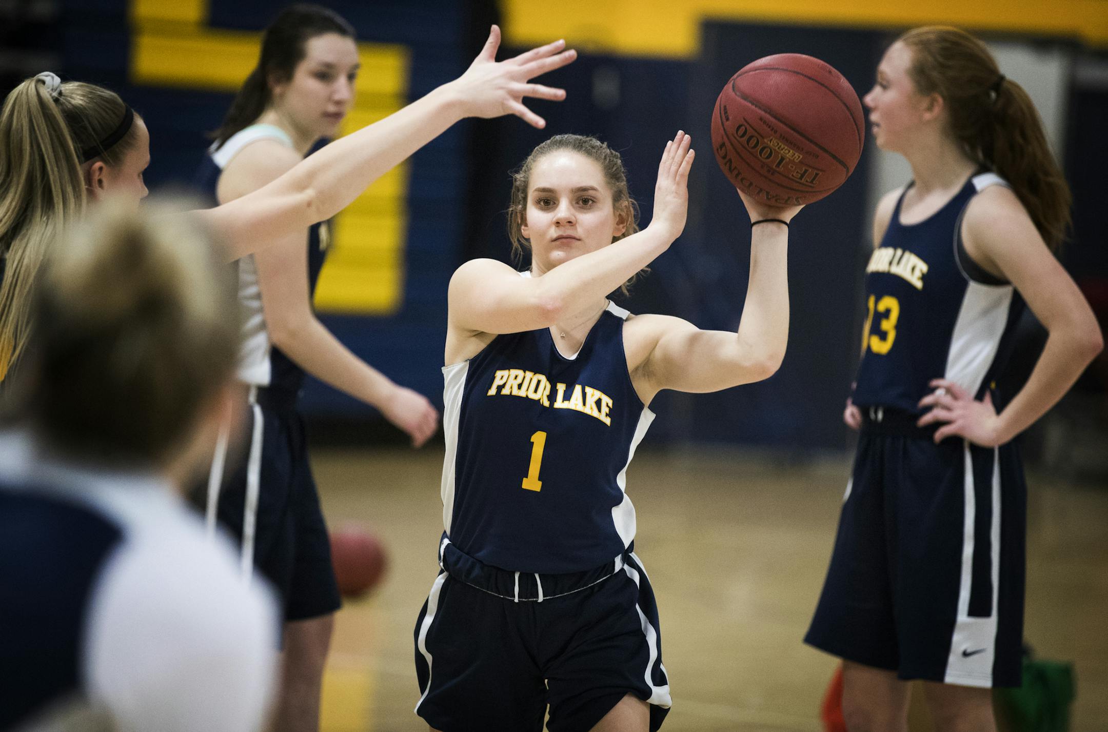 McKenna Hofschild passes the ball during practice. ] LEILA NAVIDI &#xef; leila.navidi@startribune.com BACKGROUND INFORMATION: Prior Lake girls' basketball player McKenna Hofschild practices with her team at Prior Lake High School on Monday, February 26, 2018.