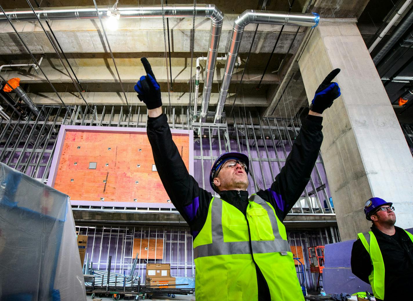 J.P. Paul, Vikings director for new stadium corporate development, pointed out where some of the 2,000 flat-screen monitors will be positioned.