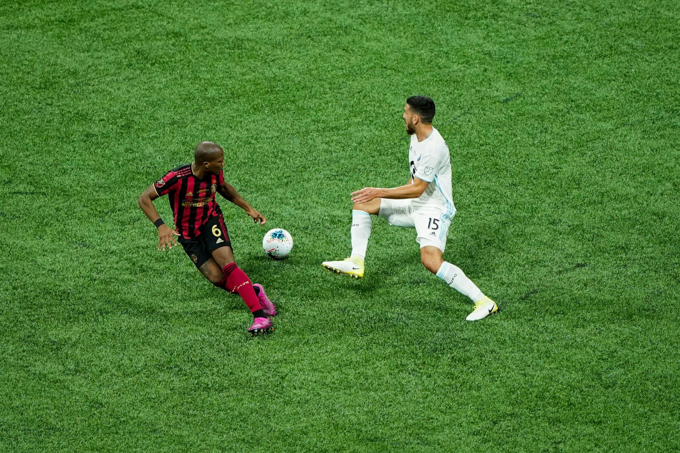 Minnesota United defender Michael Boxall (15) and Atlanta United midfielder Darlington Nagbe (6) battle for the ball during the U.S. Open Cup at Mercedes-Benz Stadium in Atlanta on Tuesday, Aug. 27, 2019. Photo by Kevin D. Liles for the Star Tribune