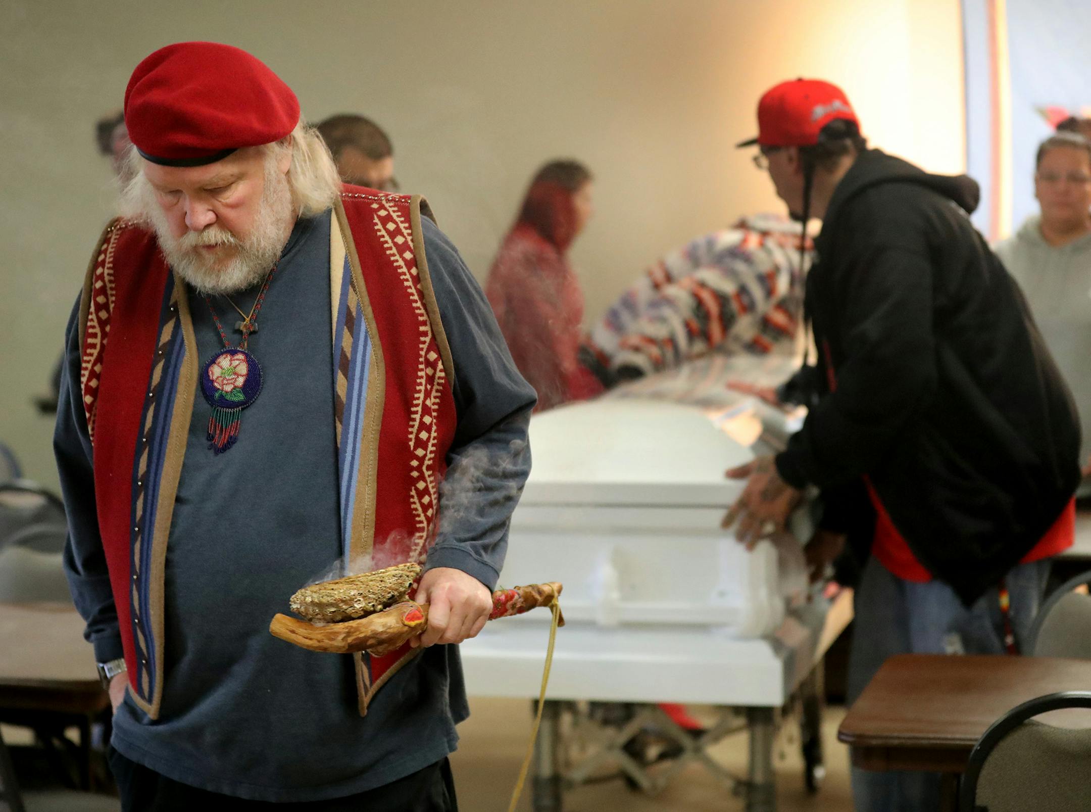 Relatives of deceased Celesta Yanez gathered at the Gichitwaa Kateri Church for a ceremony marking the closing of her casket, and the sending of her body north to her reservation. Celesta Yanez died of a drug overdose a week ago. Here, Shawn Phillips, the parish director at Gichitwaa Kateri Church leads the casket of Yanez, accompanied by members of NAH, out of Gichitwaa Kateri Church to be transported north to the reservation for burial Tuesday, Jan. 15, 2019, in Minneapolis, MN. Just want to m