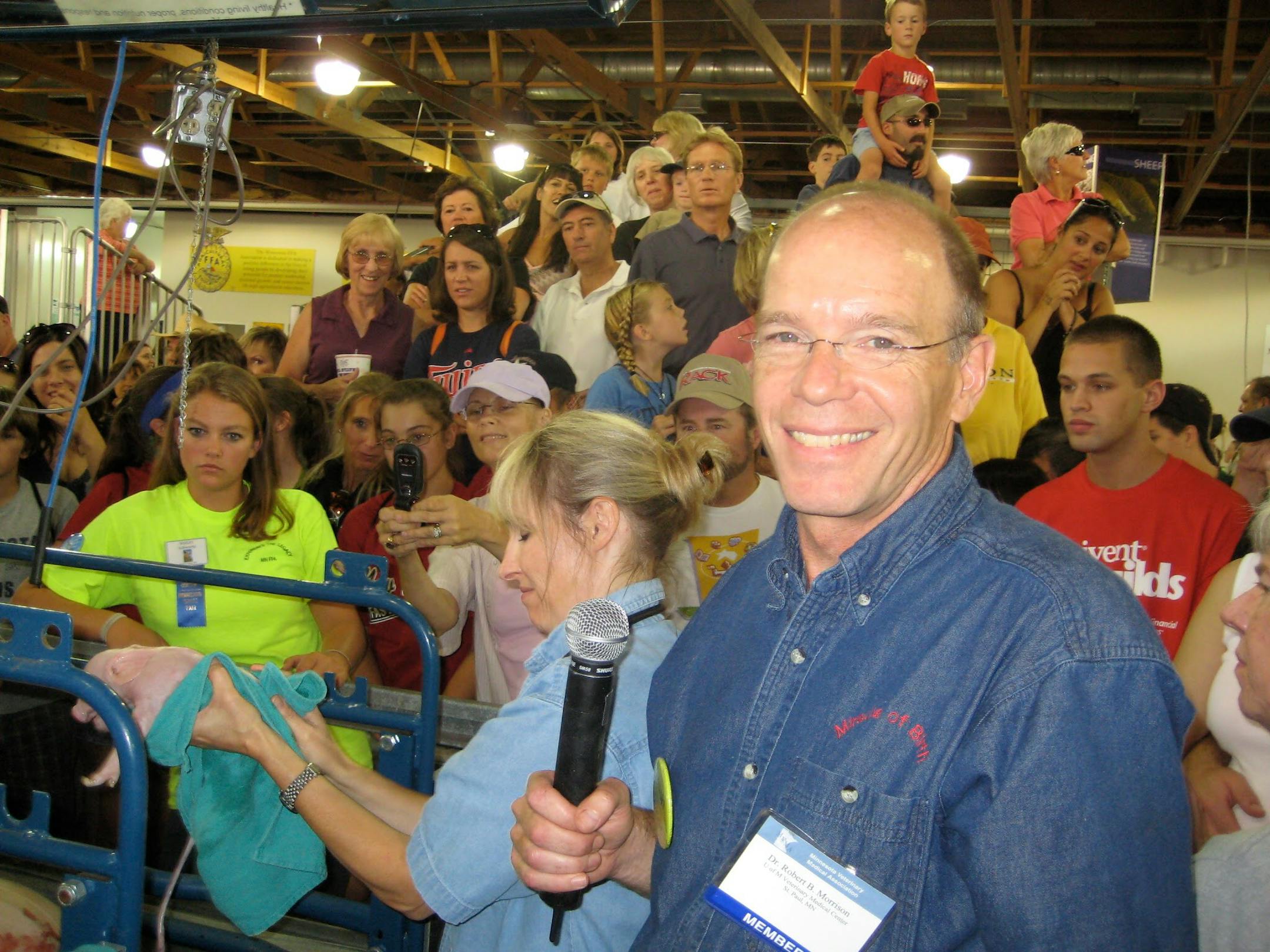 Dr. Robert Morrison volunteering at the Miracle of Birth Center at the Minnesota State Fair.