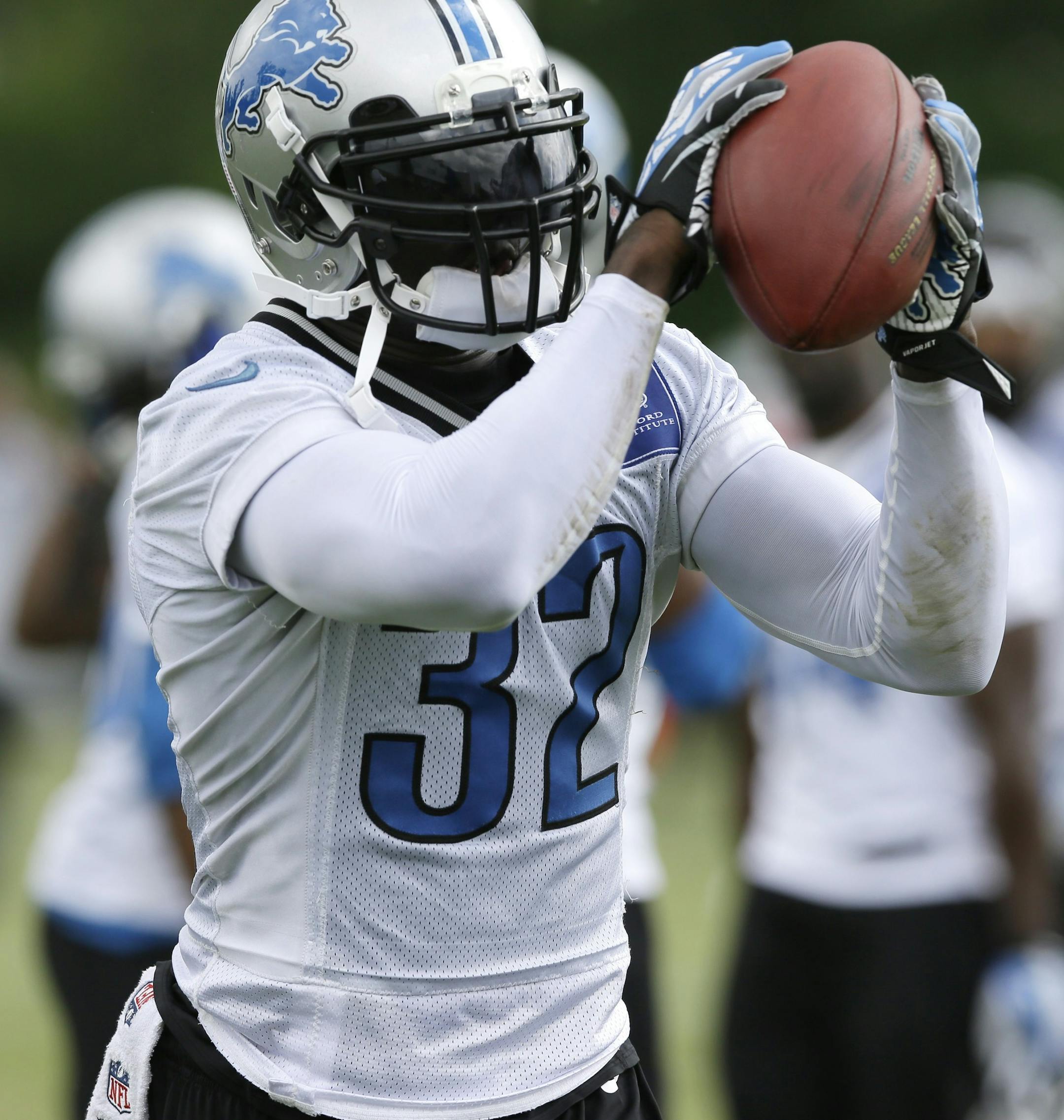 Detroit Lions safety James Ihedigbo runs through a drill during an NFL football minicamp in Allen Park, Mich., Wednesday, June 11, 2014. (AP Photo/Carlos Osorio) ORG XMIT: otkco130