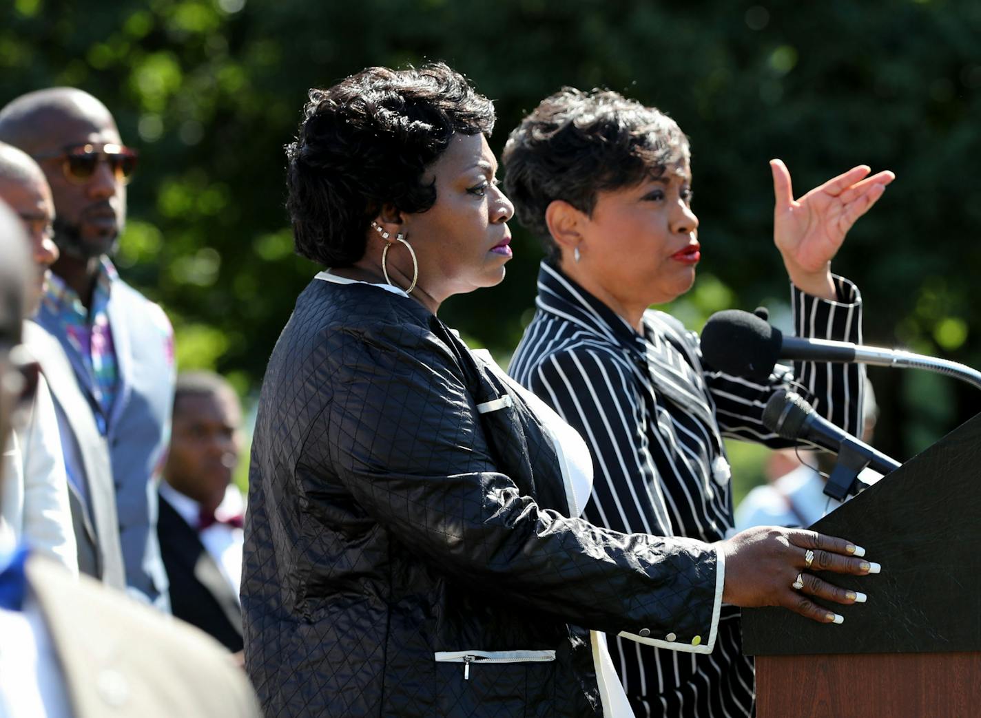 Valerie Castile, middle, the mother of Philando Castile, along with the family's lawyer, Judge Glenda Hatchett, right, announced that funeral services for Philando will be Thursday, at 12 noon at the St. Paul Cathedral.