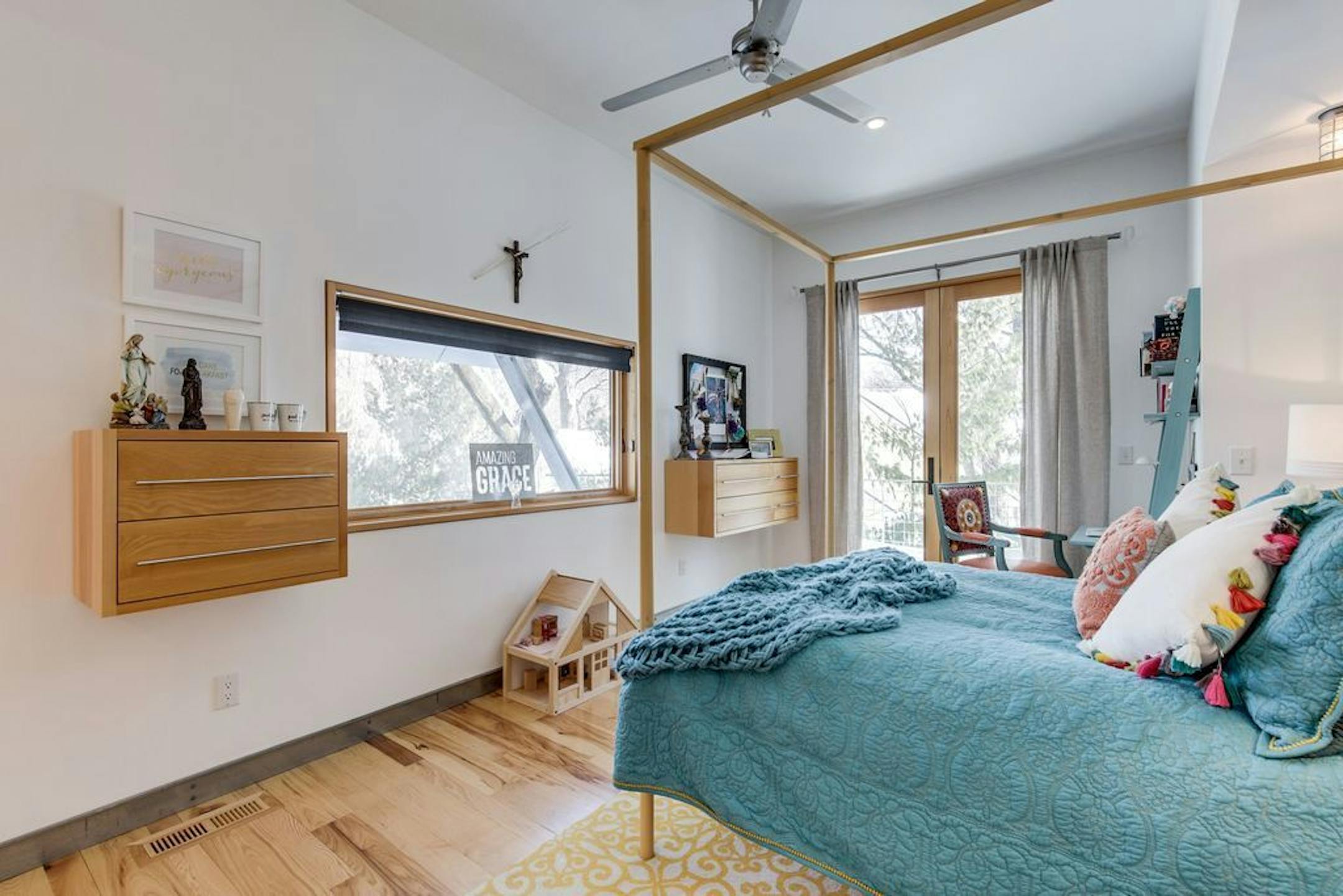 A bedroom overlooking the backyard.