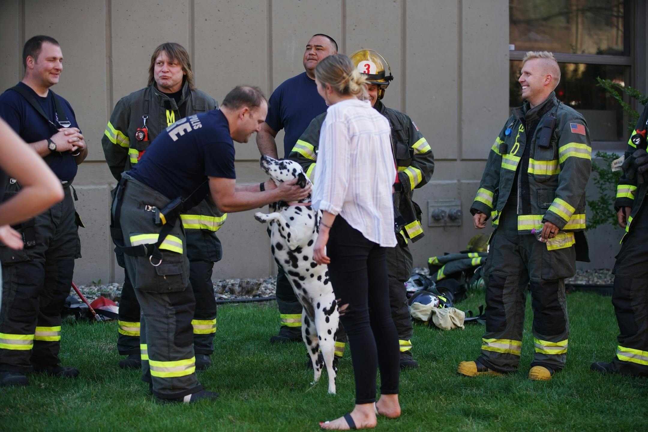 A lighter moment occurred when a Dalmatian stopped by to greet firefighters who had worked to neutralize the threat from the hazardous substance. Residents, many students were evacuated from the building.