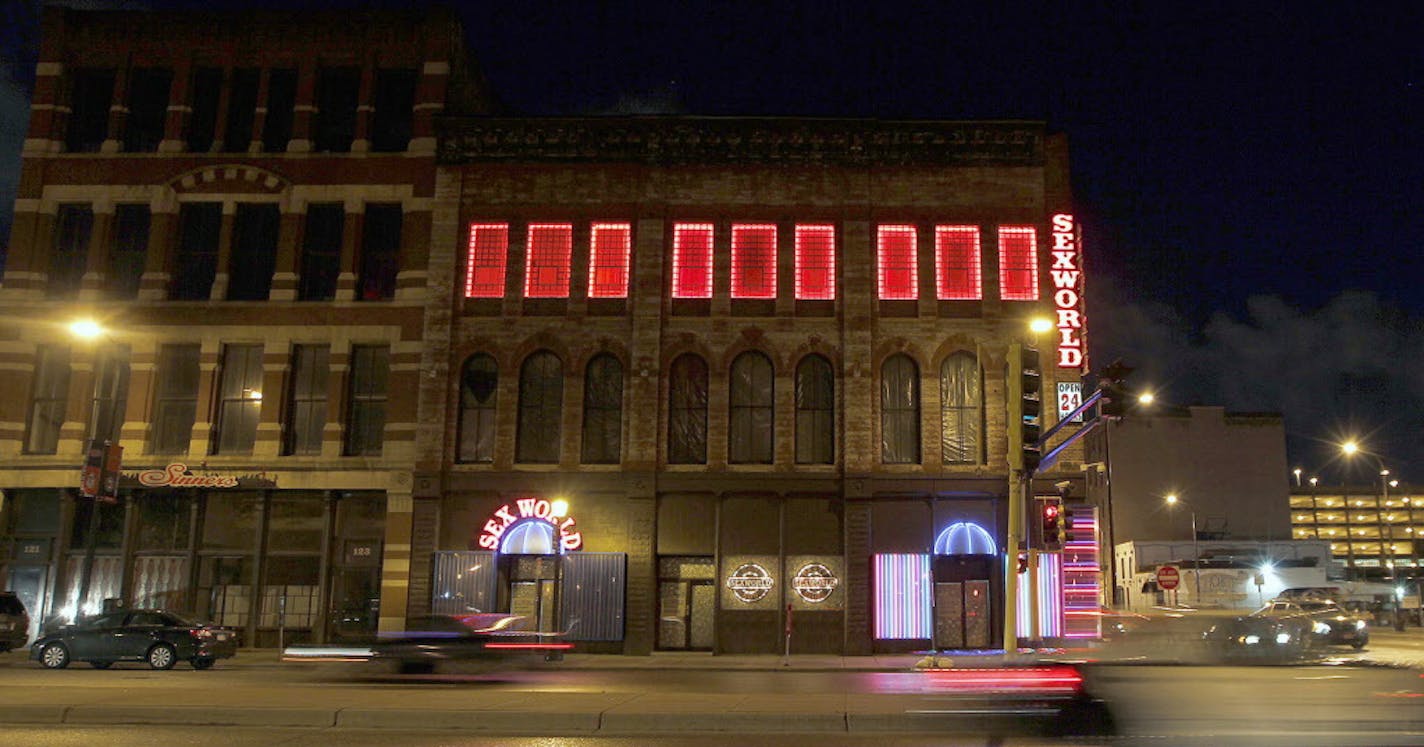 Some men gave Bobbi and a friend a ride to downtown Minneapolis and dropped them off outside of Sex World, an adult store and strip joint on Washington Avenue in the North Loop.(ELIZABETH FLORES/STAR TRIBUNE) ELIZABETH FLORES &#xef; eflores@startribune.com ORG XMIT: MIN1310180815267905