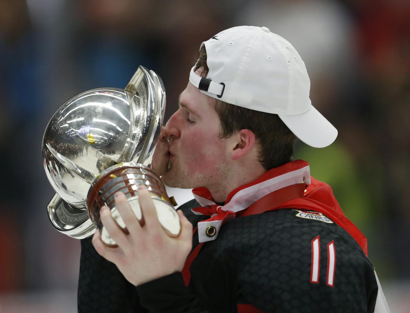 Canada's Alexis Lafreniere kisses the trophy after winning the U20 Ice Hockey Worlds gold medal match between Canada and Russia in Ostrava, Czech Republic, Sunday, Jan. 5, 2020. (AP Photo/Petr David Josek) ORG XMIT: PJO165