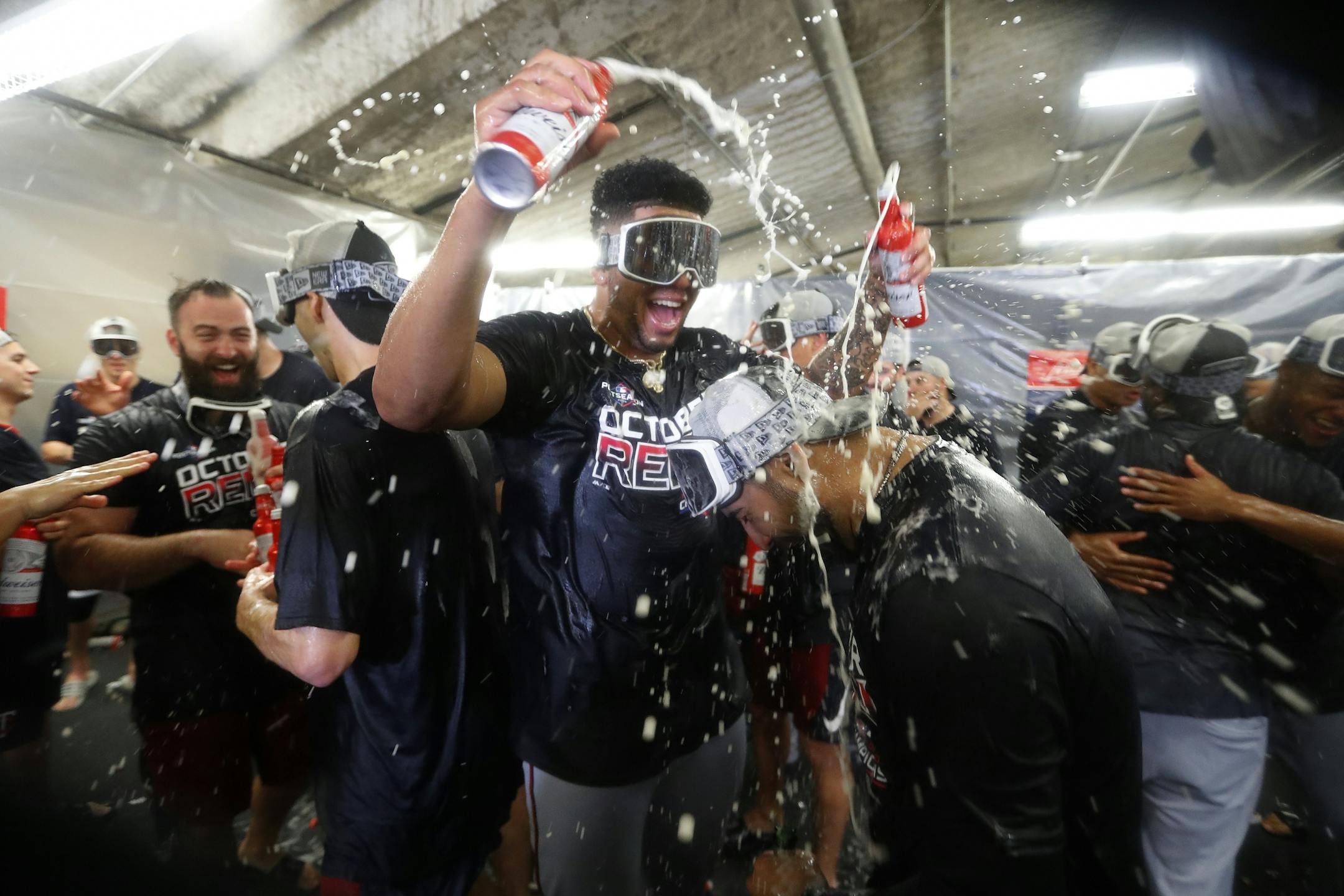 Minnesota Twins celebrate after the Twins clinched the AL Central on Wednesday, Sept. 25, 2019, in Detroit. The Twins defeated the Detroit Tigers 5-1 in a baseball game, and later clinched when the Cleveland Indians lost to the Chicago White Sox.