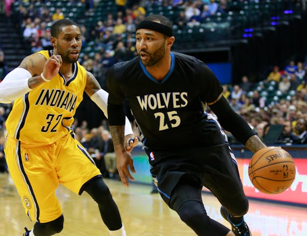 Timberwolves guard Mo Williams dribbled against Pacers guard C.J. Watson in the first half Tuesday. Williams scored a franchise-record 52 points to sp