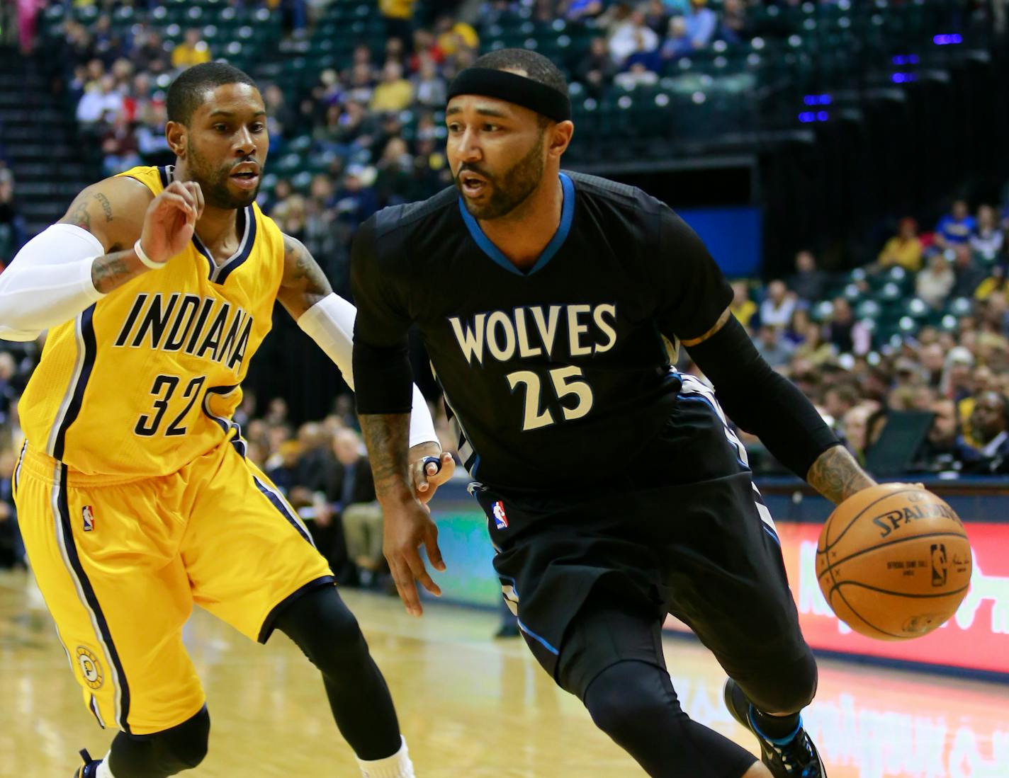 Timberwolves guard Mo Williams dribbled against Pacers guard C.J. Watson in the first half Tuesday. Williams scored a franchise-record 52 points to spark Minnesota to a 110-101 victory, ending their 15-game losing streak.