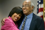 Judge Tanya Bransford gave father Jim Bransford a bear hug behind the judge's bench at the Juvenile Justice Center in Minneapolis.