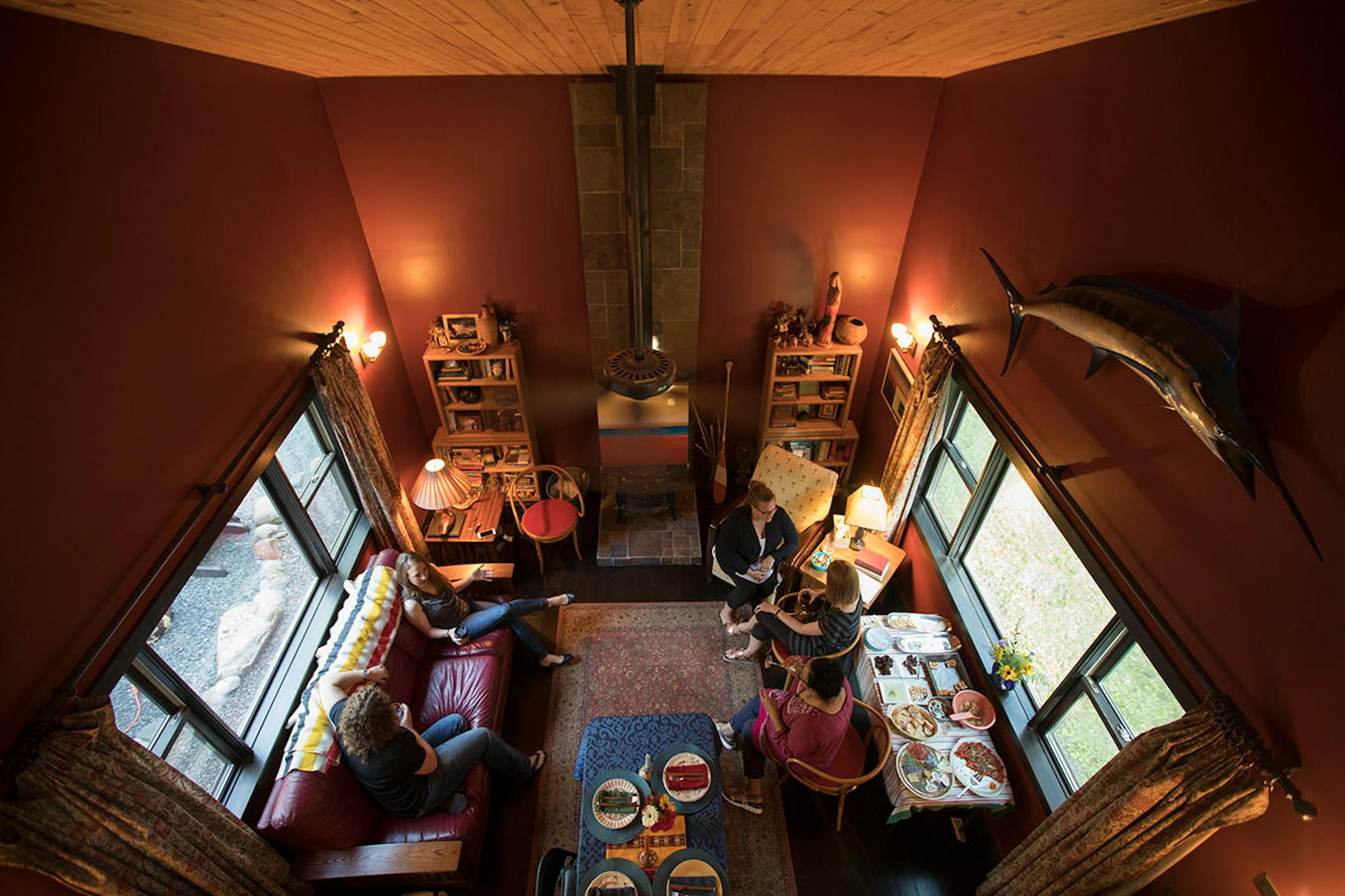 The interior is staged for comfort and conversation amongst friends.