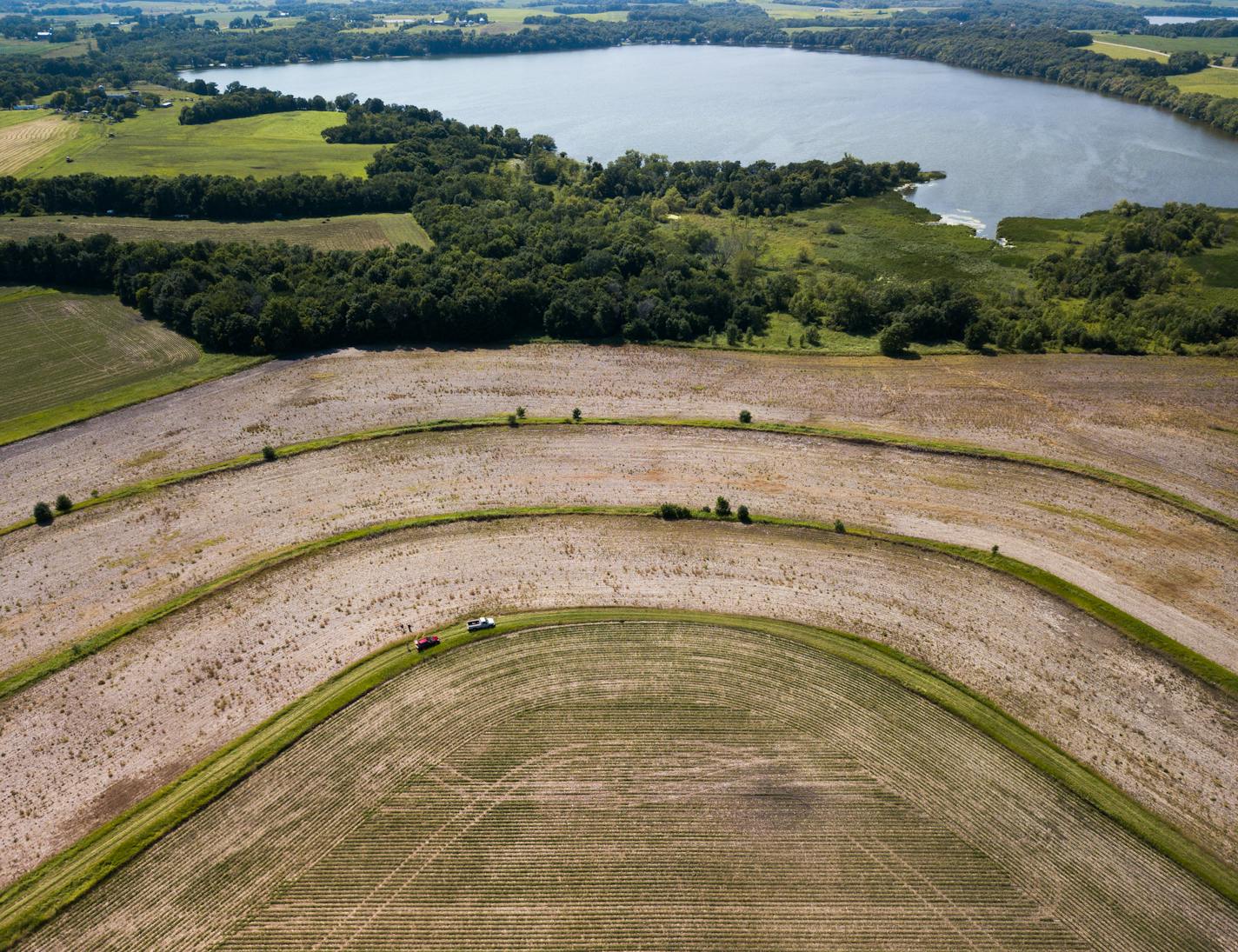 A wet spring forced Larry Conrad to leave large tracts of land bare on his farm in Dundas.