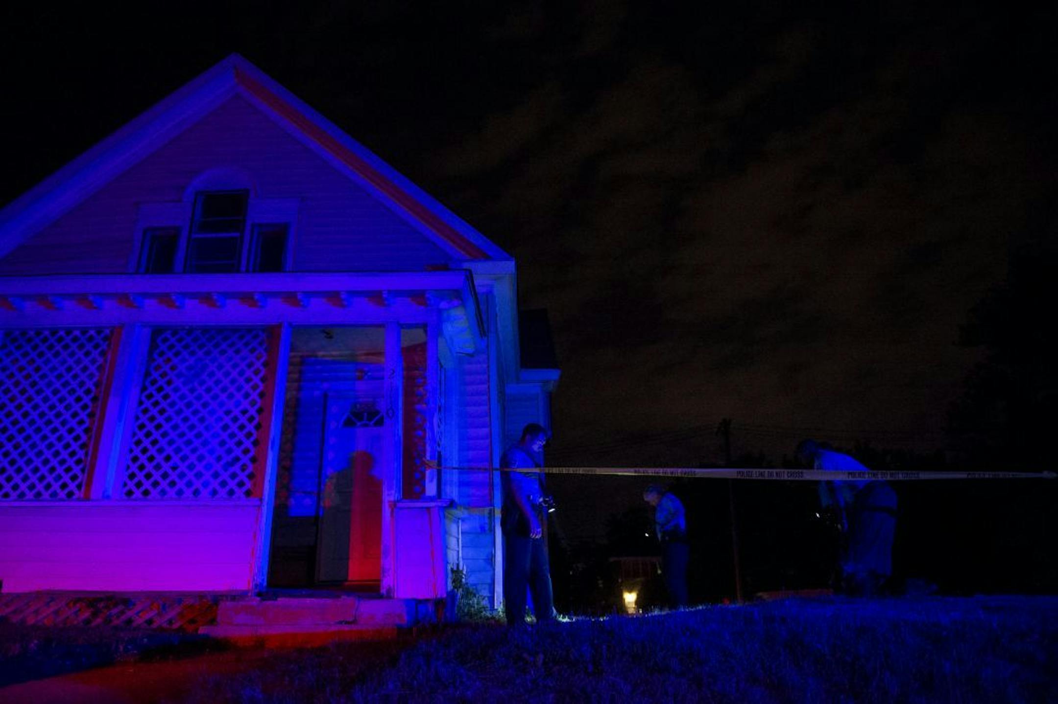 Police investigate a fatal shooting at Penn Avenue North and North 21st Avenue on Thursday, May 26, 2016 in Minneapolis, Minn.