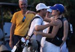 Caleb VanArragon hugs his sister, Kathryn, after he finished second in the Minnesota State Open.