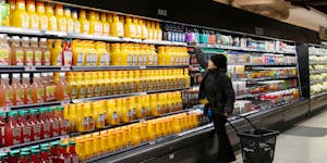Shopping at a grocery store in the East Village of Manhattan, Feb. 15, 2024. Copeland Cold Chain makes grocery refrigeration similar to this and is la