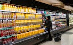 Shopping at a grocery store in the East Village of Manhattan, Feb. 15, 2024. Copeland Cold Chain makes grocery refrigeration similar to this and is la