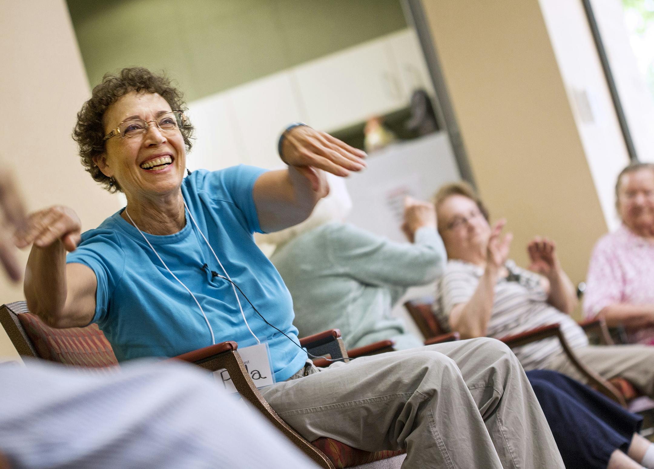 Instructor Pola Rest leads Ageless Grace, a Senior Sneakers Flex class, at The Wellington in St. Paul July 16, 2014. (Courtney Perry/Special to the Star Tribune)