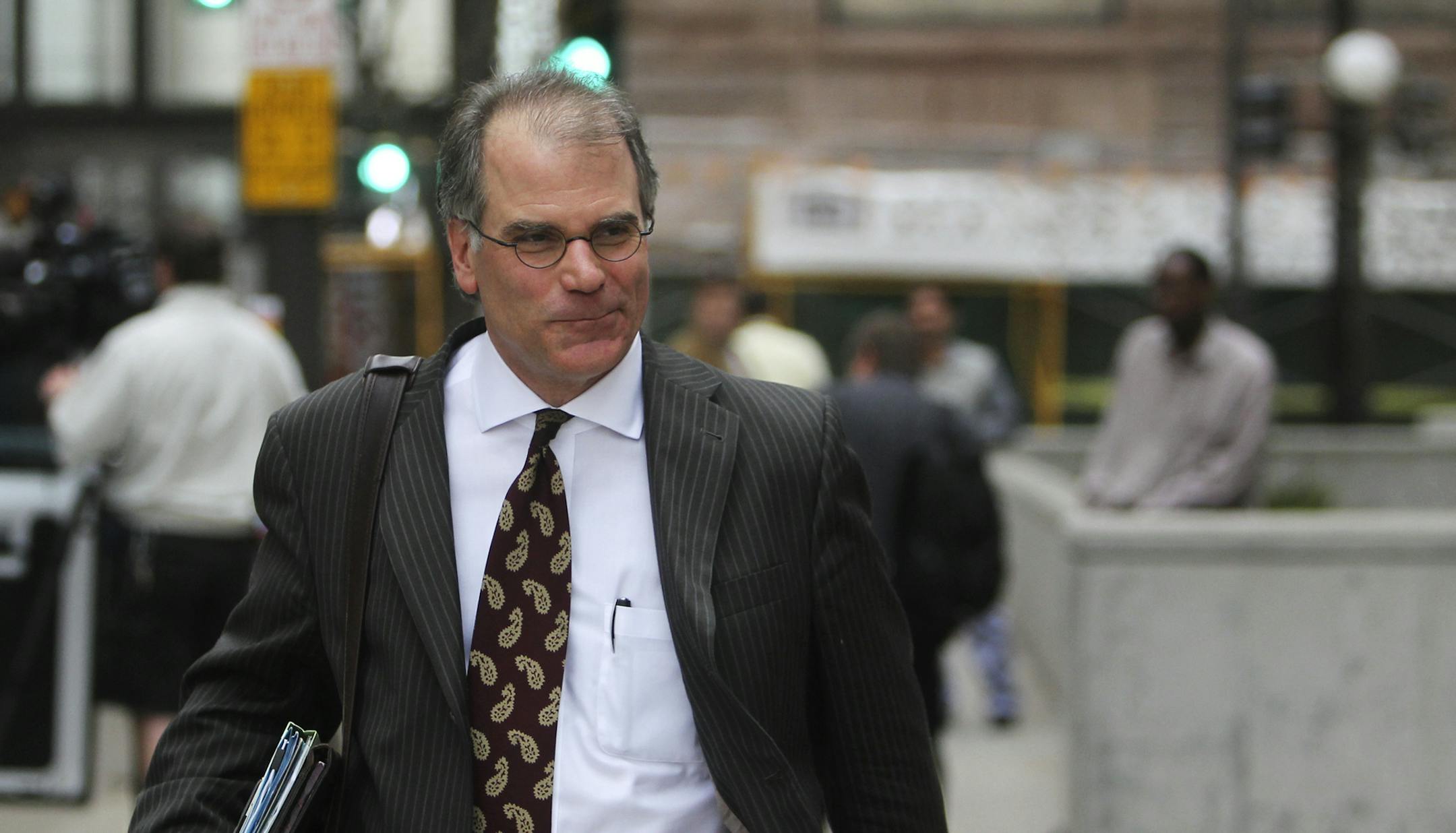 Buford Rogers, charged in federal court on May 3 with one count of being a felon in possession, appeared before Magistrate Judge Jeanne Graham, in the St. Paul Federal Courthouse, Wednesday, May 8, 2013, at 3:00 p.m., for a detention hearing in St. Paul, MN. Here, Andrew Mohring, Rogers‚Äô court-appointed attorney left the courthouse. Mohring argued authorities released misinformation to the media ‚Äúthat ought to be prohibited‚Äù and was in vio