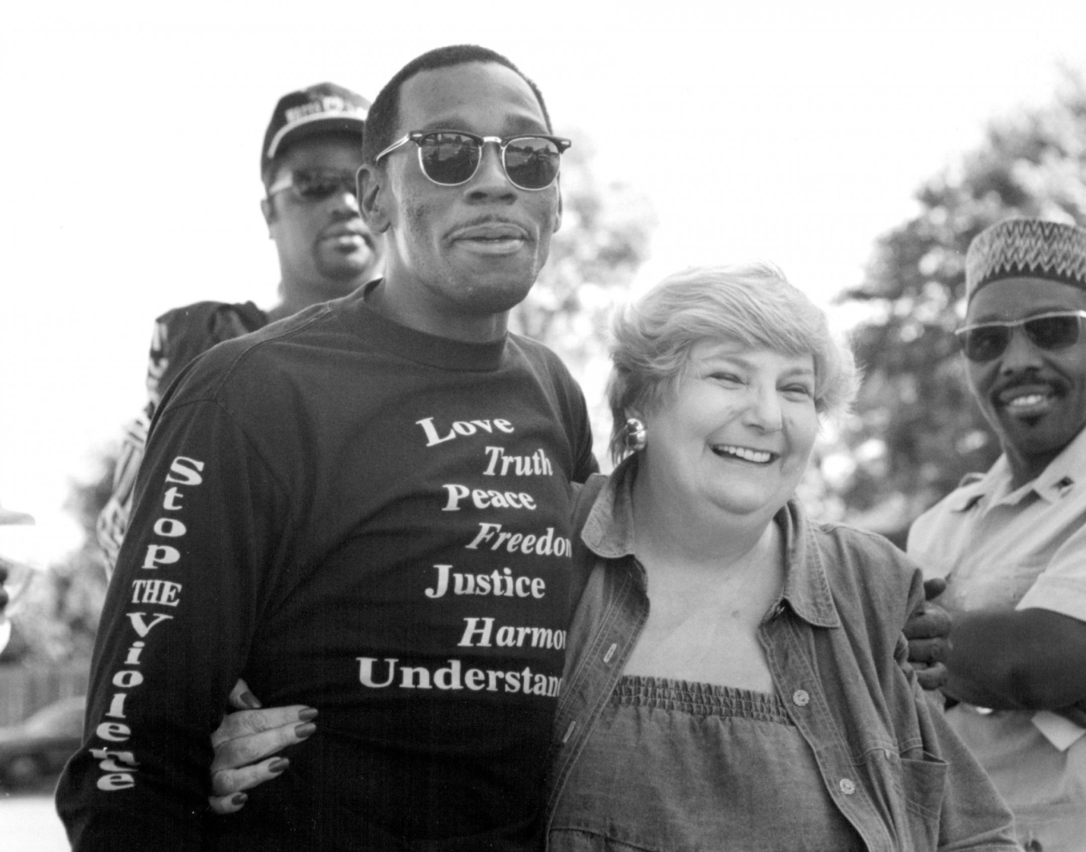 July 11, 1993 The 1993 Twin Cities Peace Summit's March and rally. Sharif Willis With the City, Inc. and United For and in Peace, Inc., Poses With KSTP radio Hostess Barbara Carlson, Who Broadcast from the Sidewalk in Front of Mount Olivet Baptist Church. Carlson asked for Police Protection before the Show When she had a Verbal altercation With a Peace Summit representative. Joey McLeister, Minneapolis Star Tribune
