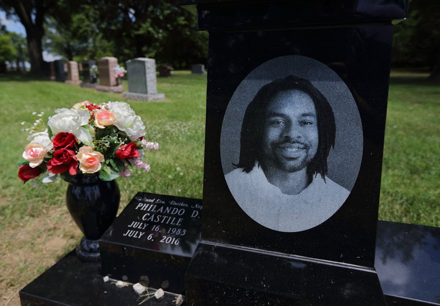 Philando Castile's grave at Calvary Cemetery in St. Louis on the one-year anniversary of his death.