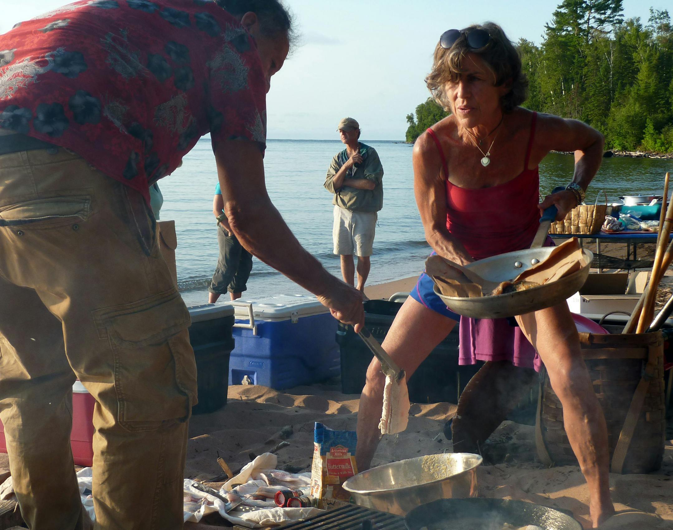 Beth Dooley and Nick Vander Puy fry whitefish for a beach dinner at Lake Superior, through Wilderness Inquiry. ] kayak apostle islands lee dean