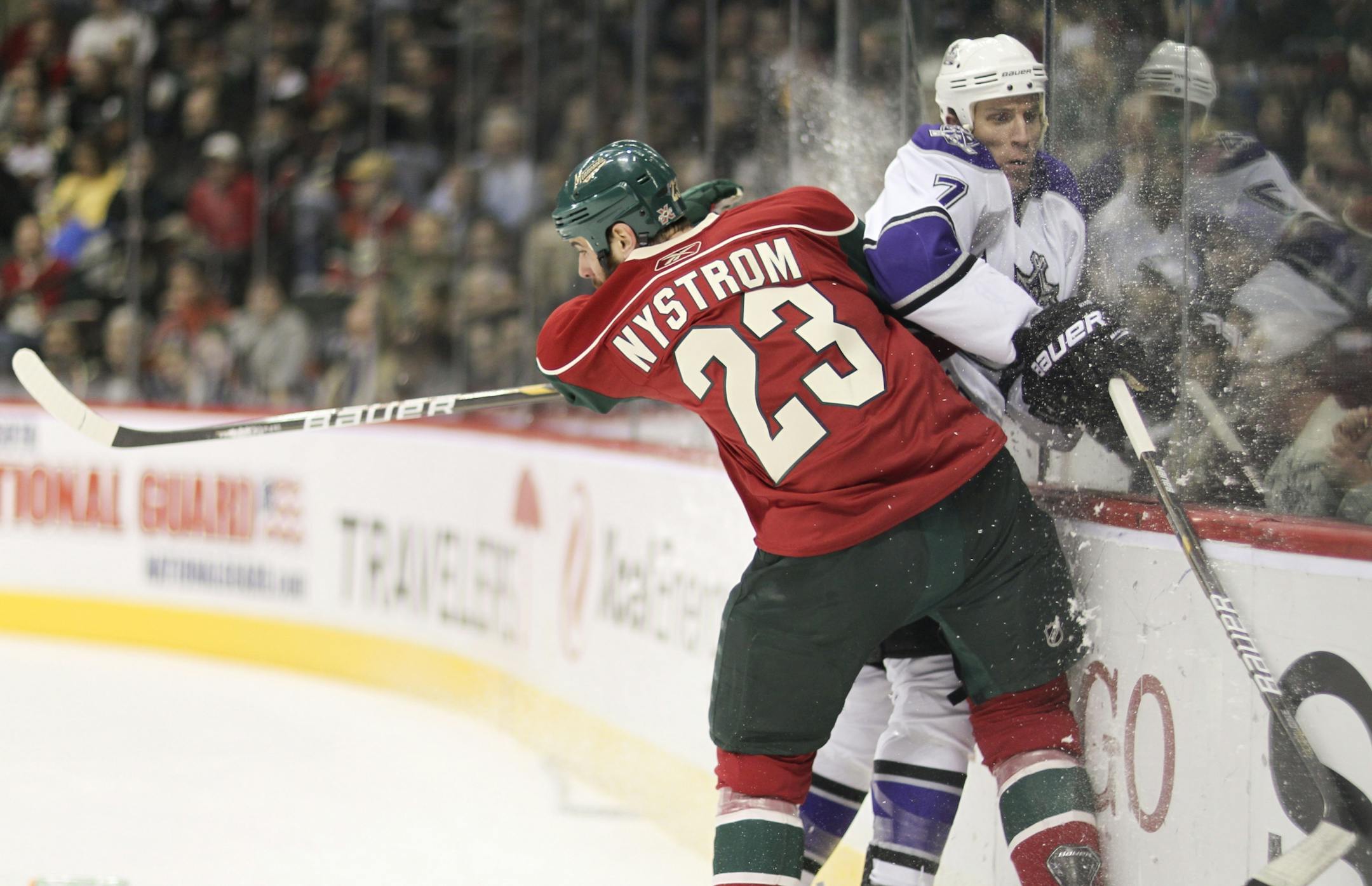 The Wild's Eric Nystrom checked the Kings' Rob Scuderi last season.