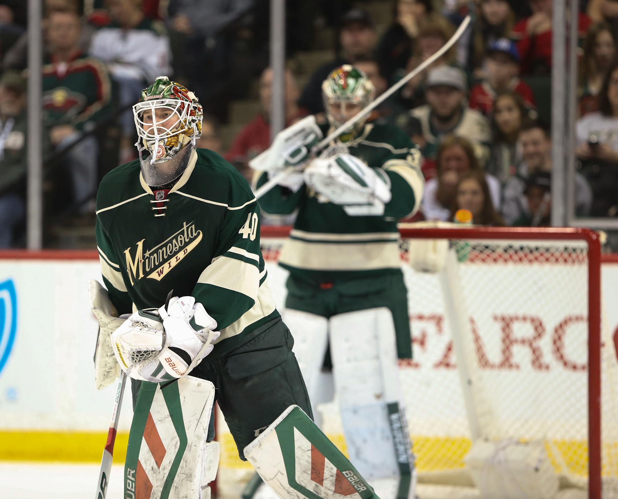 Wild goalie Devan Dubnyk (40) skated to the bench after being replaced by Wild goalie Darcy Kuemper (35) after allowing a third St. Louis Blues goal in the second period Sunday night. ] JEFF WHEELER � jeff.wheeler@startribune.com The Minnesota Wild faced the St. Louis Blues in an NHL hockey game Sunday night, March 6, 2016 at Xcel Energy Center in St. Paul.