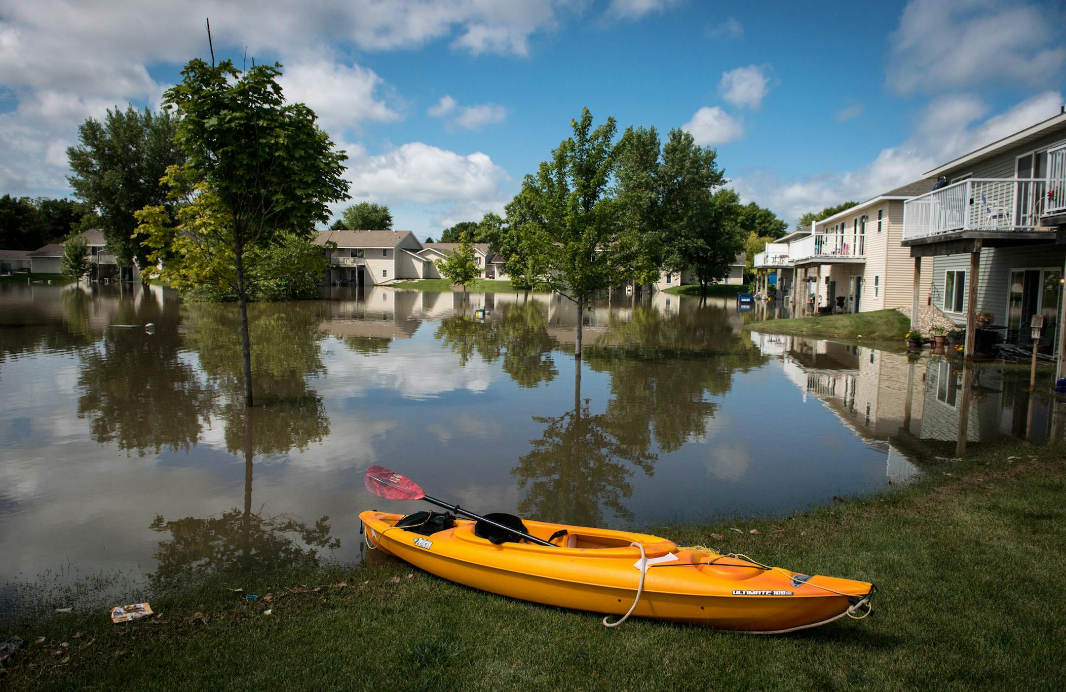 One resident said he took out his kayak into the floodwater behind his apartment earlier this morning . ] (AARON LAVINSKY/STAR TRIBUNE) aaron.lavinsky@startribune.com Slow moving thunderstorms overnight dropped copious amounts of rain across central Minnesota and the Twin Cities, leading to flooding. And more rain is in the forecast for Thursday. We photograph damage in the city of Willmar, where upwards of a foot of rain fell, on Thursday, August 11, 2016.