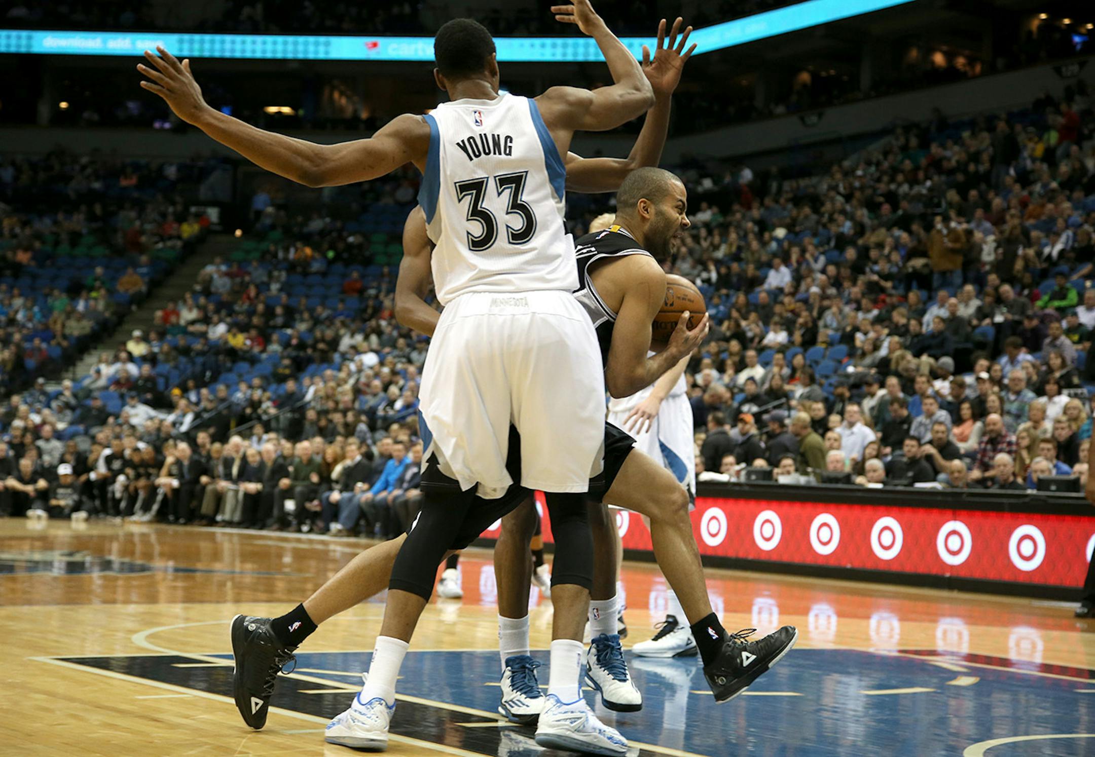 The Spurs Tony Parker spilt the Wolves defense to score during the first half. ] (KYNDELL HARKNESS/STAR TRIBUNE) kyndell.harkness@startribune.com Timberwolves vs San Antonio at the Target Center in Minneapolis Min., Saturday, January 10, 2014.